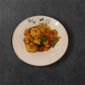 Scampis sautés aux ananas sauce aigre-douce